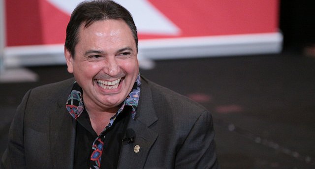 Perry Bellegarde laughing at his table at Canadian Club Toronto event